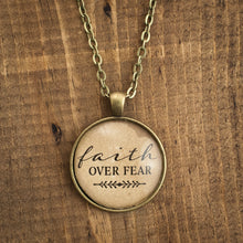 "faith over fear" necklace
