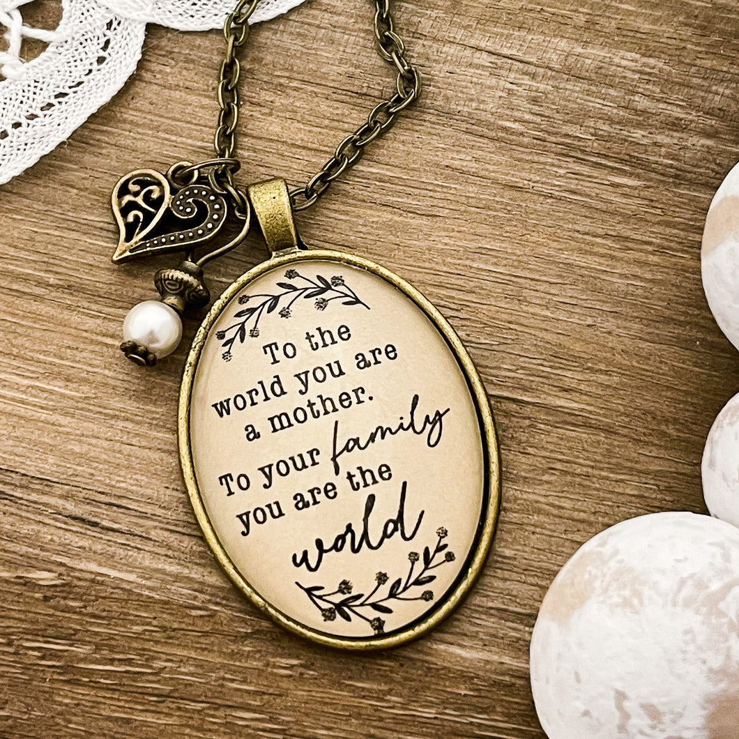 To the world you are a mother, to your family you are the World necklace