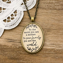 To the world you are a mother, to your family you are the World necklace